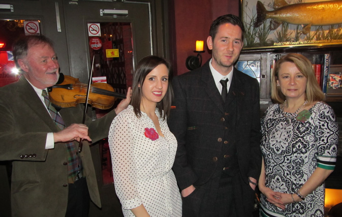 Violinist Phil Howes; Hannah Choat, PR Assistant VisitBritain; Michael McCuish, PR Executive - North America VisitScotland; and Cathy Stapells, PR and Communications Manager Canada for VisitBritain promoting Scotland’s food and drink.