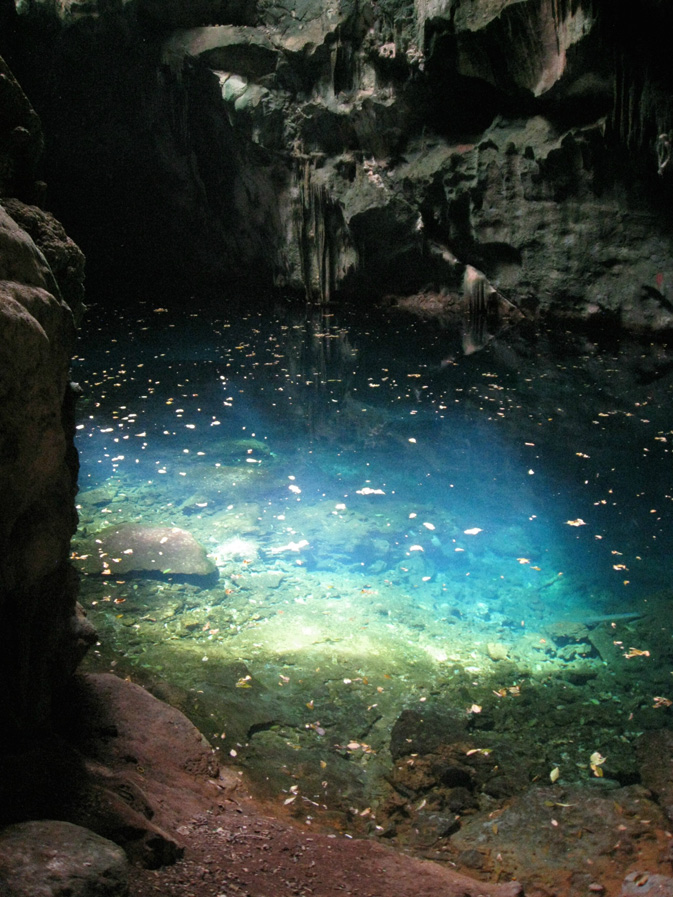 Descend into the Gasparee Caves — a natural limestone cave system — and you’ll find a crystal-clear blue lagoon.