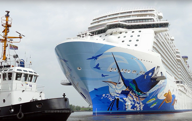 [VIDEO] Norwegian Escape gets floated out of its building dock