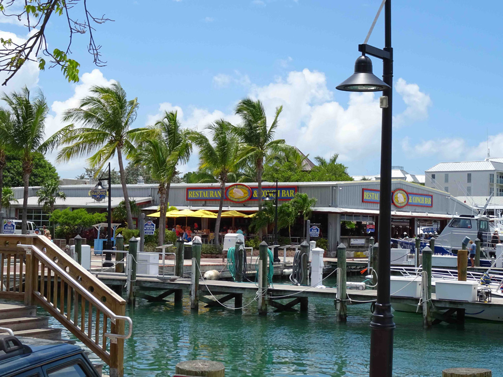 Key West Seaport is home to many historical seafood restaurants including the Conch Republic. A popular spot for visitors and locals.