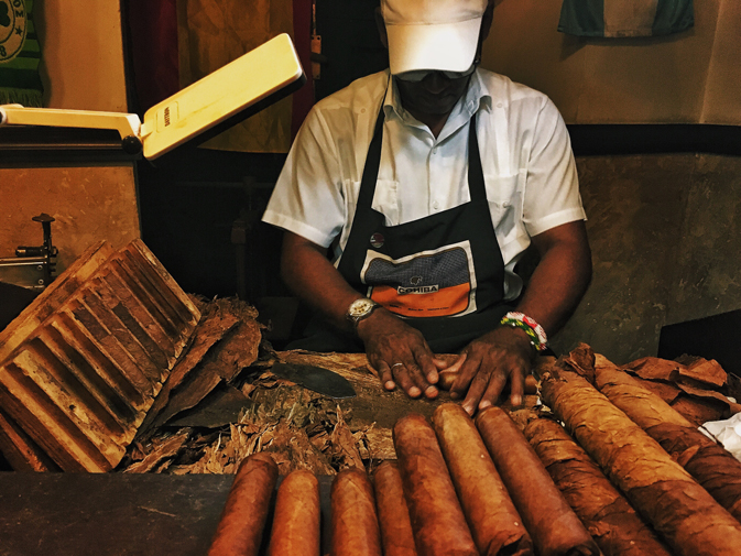 Perfecting his craft at a cigar bar in Havana