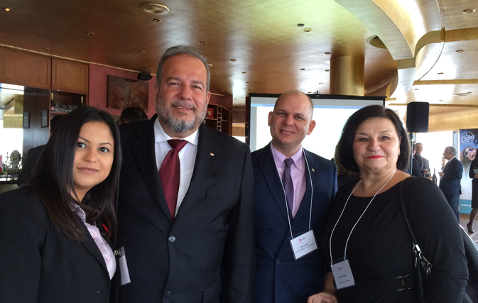 Sobeida Feliz, Global Account Manager, Warwick International Hotels; Cuba's Minister of Tourism, Manuel Marrero; Eloy Govea, Director of Cuba Tourism Office in Toronto; and Sylvie Legare, Senior Director Product, Transat Tours Canada.