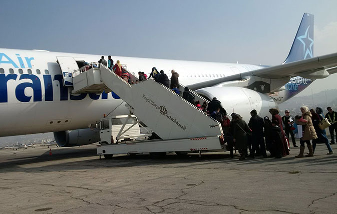 Air Transat brings 207 Syrian refugees to Canada