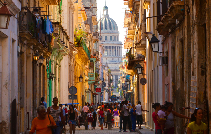 U.S. loosens rules on Cuba “people-to-people’ travel, U.S. dollar