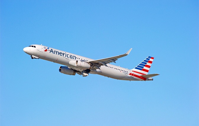 American will reward fliers based on dollars, not miles