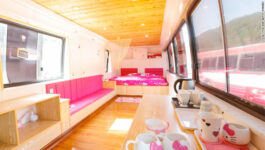 China park transforms old buses into Hello Kitty hotels