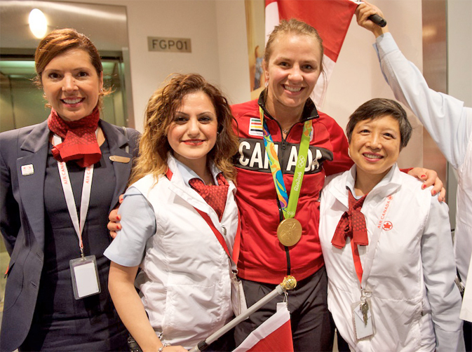 Air Canada employees with Erica Wiebe, Gold medalist in Women's 75 kg Wrestling
