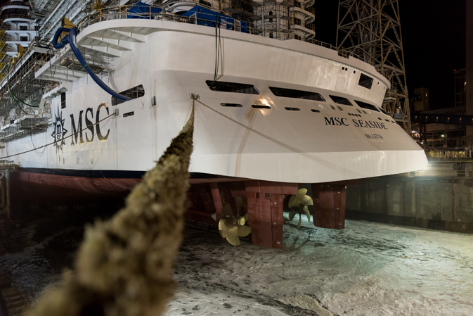 Water filling up the dry dock and MSC Seaside to touch the water for the first time