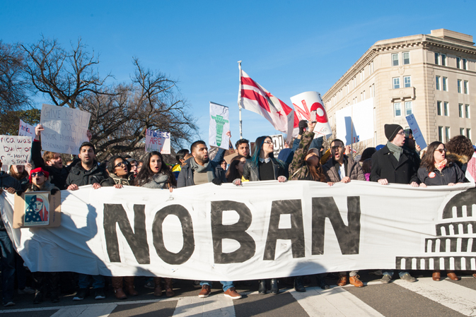 Protesters rally against President Trump's travel ban on February 4, 2017 in Washington DC