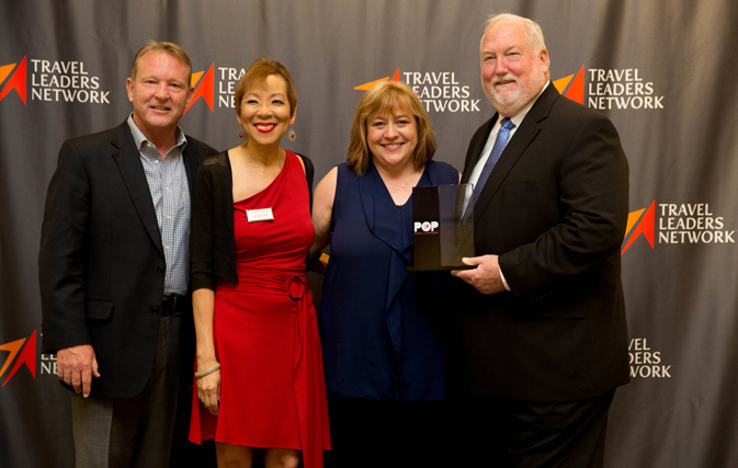 TL Network’s Vacation.com URL “will be leading edge in terms of lead generation online”, says Deanna Byrne, President, The Destination Experts. Byrne (second from right) was on hand to accept a TL Network Canada 2017 President’s Award at the Travel Leaders 2017 International Conference in Orlando, from John Lovell, CTC, President of Travel Leaders Network, Leisure Group and Hotel Division (left), TL Network Canada VP Christine James (second from left) and Roger Block, President, Travel Leaders Network.