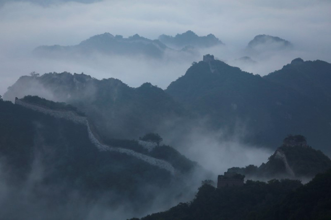Early morning fog covers the Jiankou section of the Great Wall, located in Huairou District, north of Beijing, China, June 7, 2017. REUTERS/Damir Sagolj