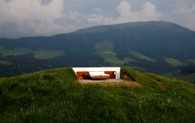 A view shows the bedroom of the Null-Stern-Hotel (Zero-star-hotel) land art installation by Swiss artists Frank and Patrik Riklin on an alp near Gonten, Switzerland June 1, 2017. REUTERS/Arnd Wiegmann