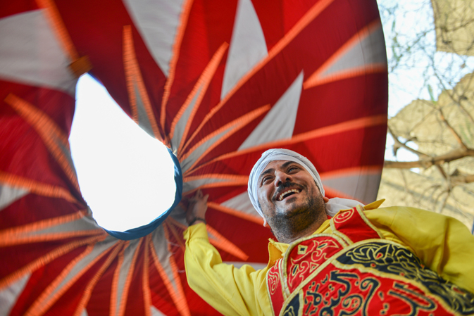 The whirling dervish of Al Tannoura Folklore Troupe, Cairo, Egypt during the International Folklore Festival held in the city center.