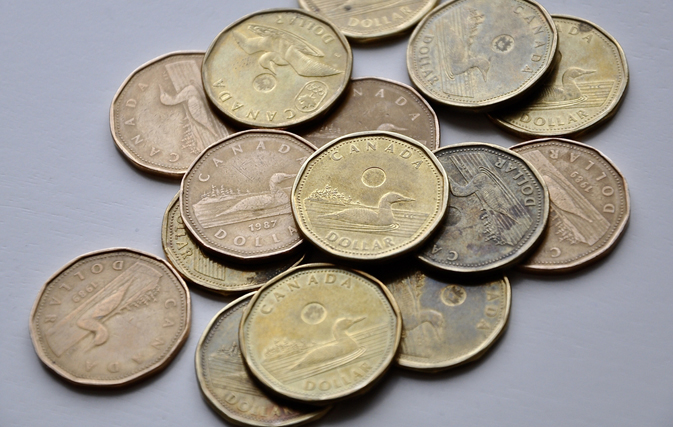 Time to book south of the border: Loonie hits 80 cents for first time in a year