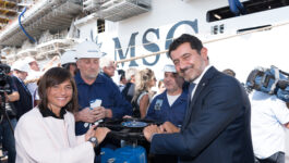 Gianni Onorato and Debora Serracchiani open the valves at the float out ceremony of MSC Seaview