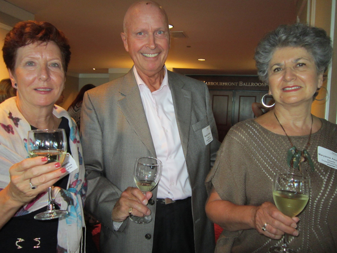 The German National Tourism Office had a full house for its Vancouver stopover on Sept. 11 before heading south to U.S. points. Travel agents Marie Stenzel of ManMar Vacations Int'l Ltd. (left), Manfred Stenzel, and Maryanne Asuncion both of Cruiseshipcentres enjoyed some of the country's fine wines.