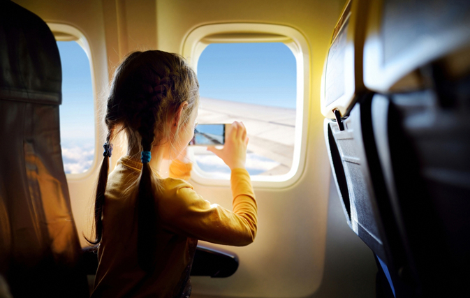 A 7-year-old girl snuck away from a train station and managed to board a flight