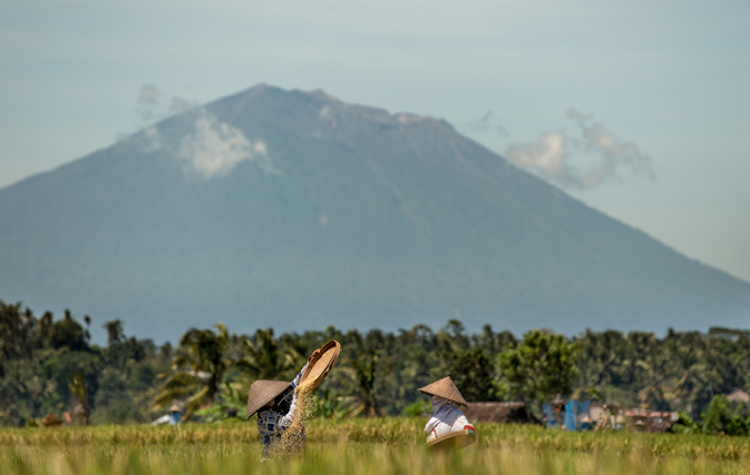 Bali volcano spews ash and cloud