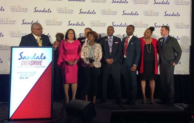 Gary Sadler, Maureen Barnes-Smith and members of the Sandals team