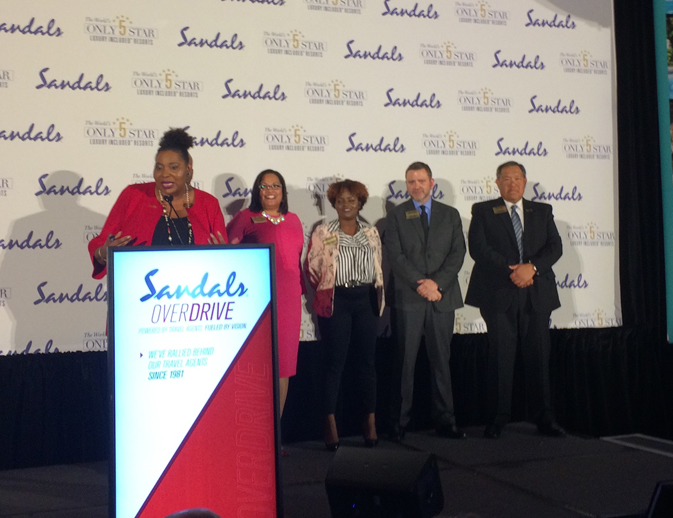 Maureen Barnes-Smith and members of the Sandals Resorts sales team