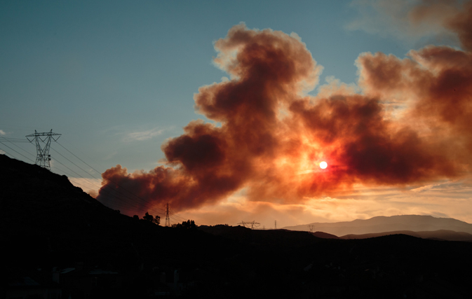 Fire forces thousands to evacuate Southern California