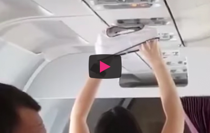 Caught on video: Woman dries underwear mid-flight with overhead vent