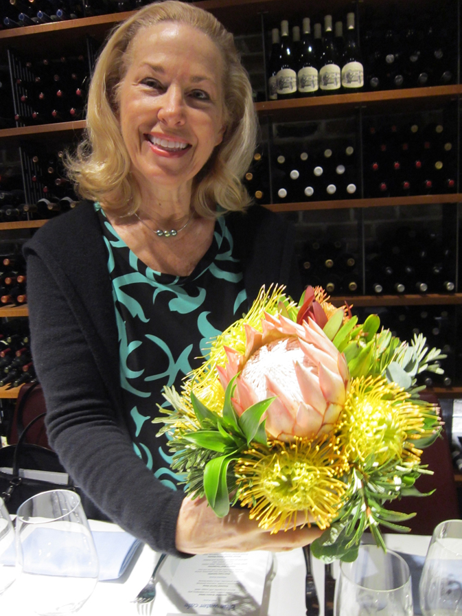 Candy Aluli, representing the Napili Kai Beach Resort, shows off one of Hawaii's attractions: beautiful flora.