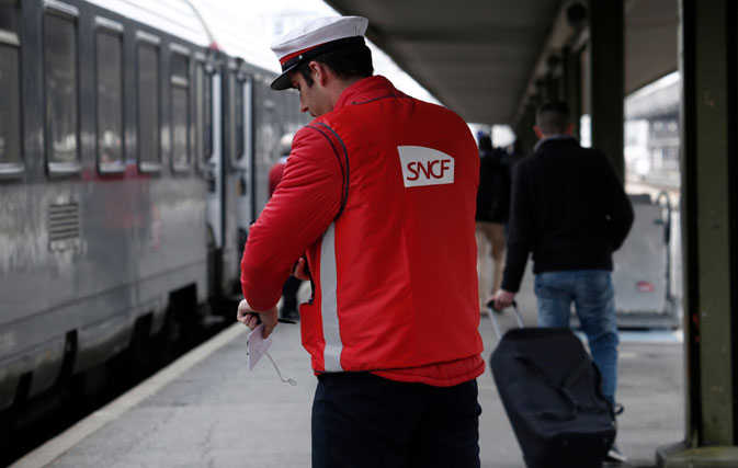 French strikes cause railway chaos and flight cancellations