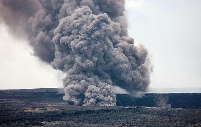 Earthquakes damage roads as ash falls from Hawaii volcano