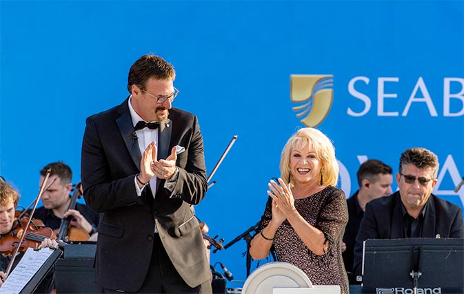 Seabourn Ovation godmother Elaine Paige gets a special bridge tour from the ship’s Captain, Stig Betten (left), and Staff Captain, Stefan Tsvetkov. 