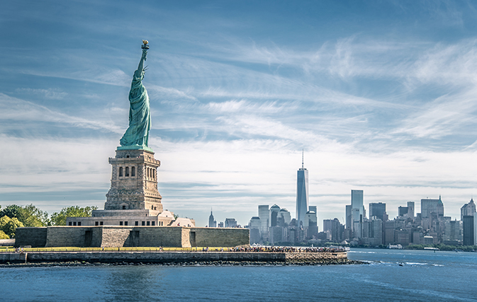 Protester's climb shuts down Statue of Liberty