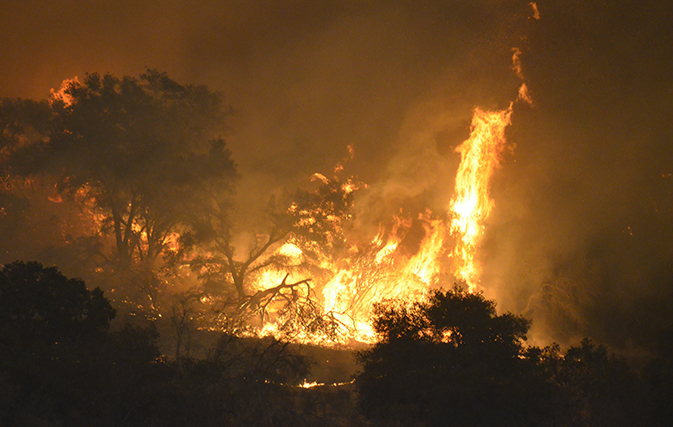 Death toll rises as California fires rage on