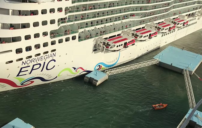 Just a little to the right! Norwegian Epic crashes into moorings while docking