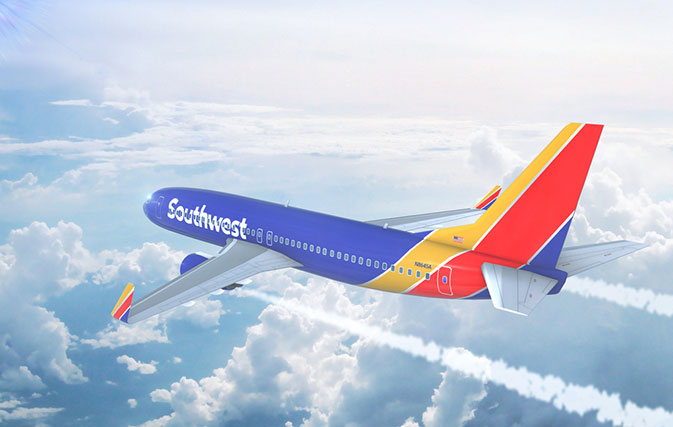 Southwest flight attendant melts hearts with the way he gets baby to stop crying