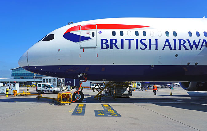 Climate-change-activist-climbs-on-BA-plane-in-London