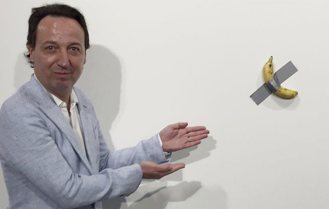 Banana-duct-taped-to-the-wall-goes-for-150000-at-Art-Basel-Miami