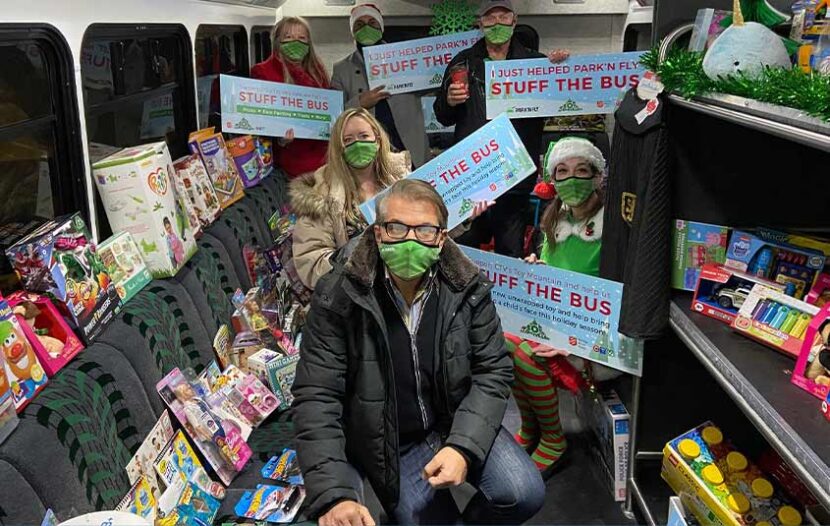 Park’N Fly stuffs the bus with toys in support of Toy Mountain